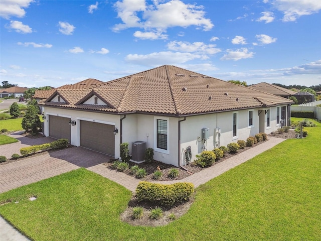 view of front of home featuring central AC and a front yard