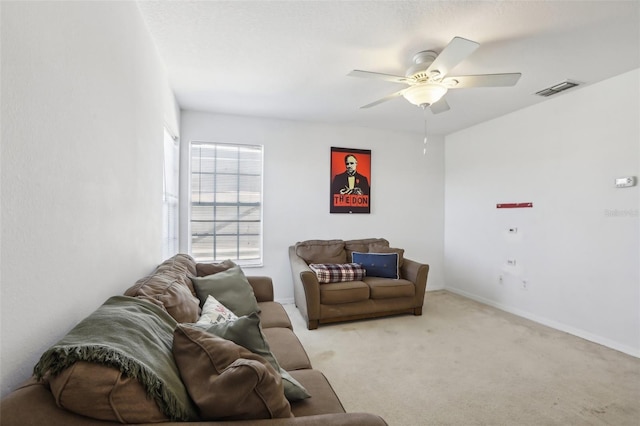 7720 Rathdown Ln, Wesley Chapel, FL 33545 - living area featuring ceiling fan and light carpet
