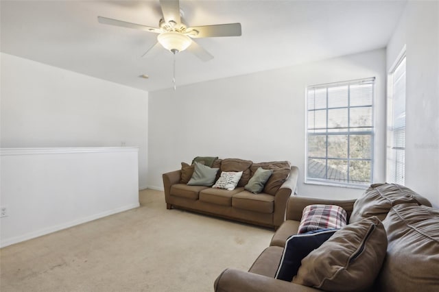 7720 Rathdown Ln, Wesley Chapel, FL 33545 - living area with healthy amount of natural light, light colored carpet, and ceiling fan