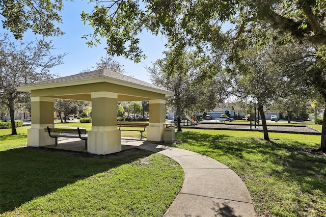 7720 Rathdown Ln, Wesley Chapel, FL 33545 - view of community with a gazebo and a yard