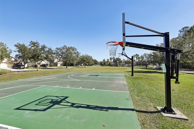 7720 Rathdown Ln, Wesley Chapel, FL 33545 - view of sport court featuring community basketball court and a lawn