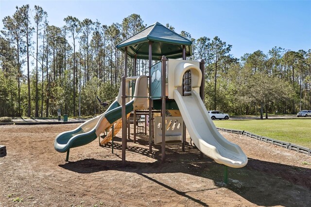 7720 Rathdown Ln, Wesley Chapel, FL 33545 - community playground with view of wooded area
