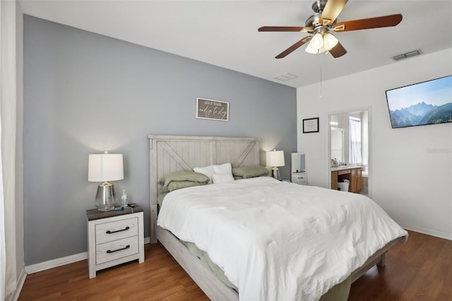 bedroom featuring ceiling fan and dark wood-type flooring