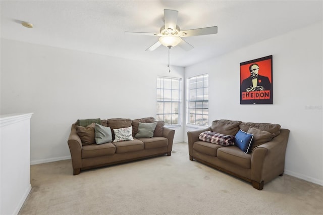 living room with ceiling fan and light carpet