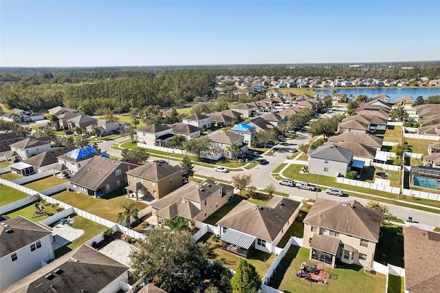 7720 Rathdown Ln, Wesley Chapel, FL 33545 - aerial perspective of suburban area featuring a large body of water