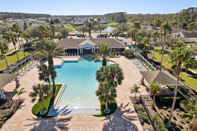 7720 Rathdown Ln, Wesley Chapel, FL 33545 - community pool featuring a residential view