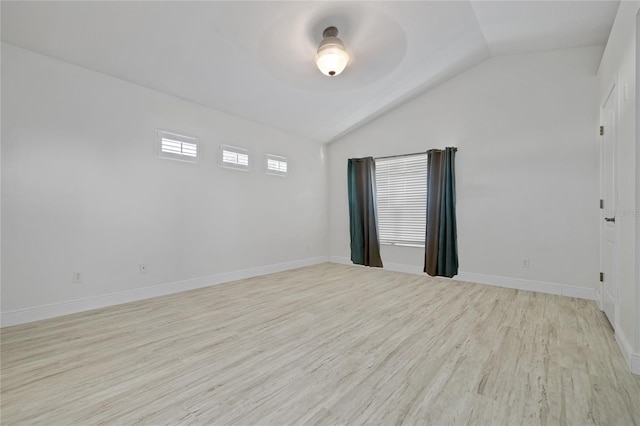 unfurnished room featuring lofted ceiling, ceiling fan, and light hardwood / wood-style flooring