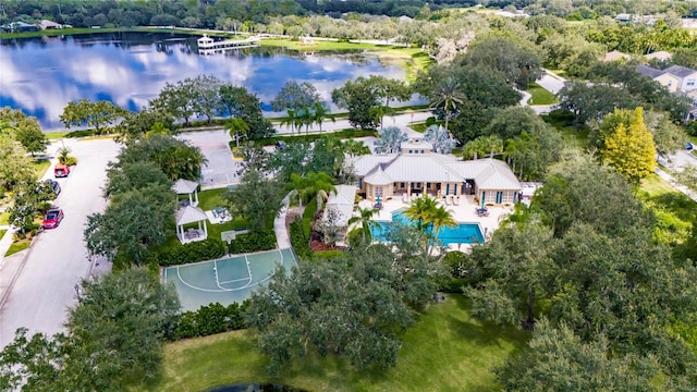 birds eye view of property featuring a water view