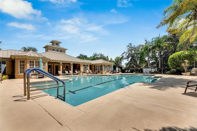 view of pool featuring a patio area