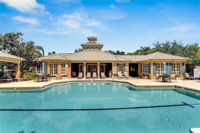 view of pool featuring a patio