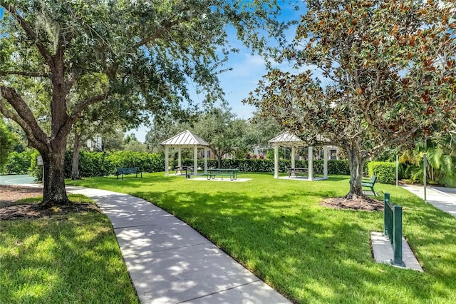 view of community featuring a lawn and a gazebo