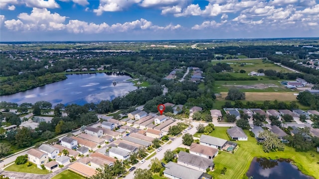 drone / aerial view with a water view