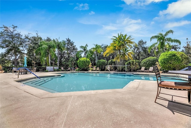 view of pool featuring a patio