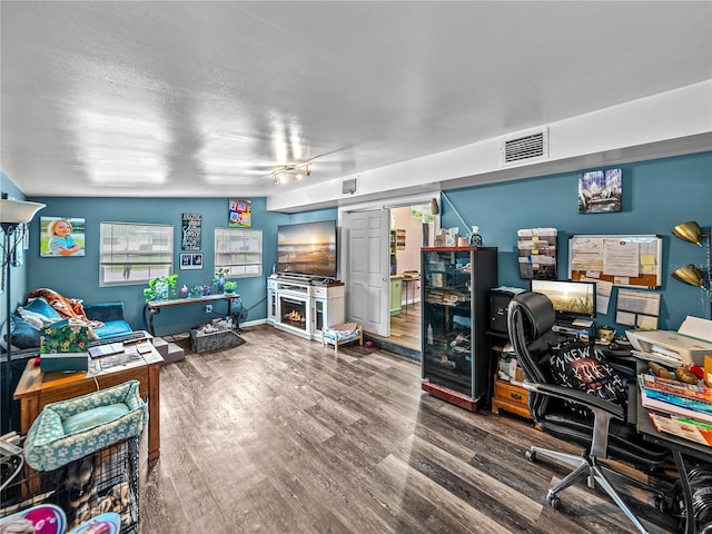 office area with hardwood / wood-style floors