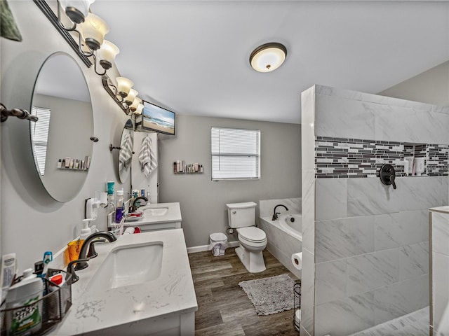 full bathroom with plus walk in shower, vanity, hardwood / wood-style floors, and toilet