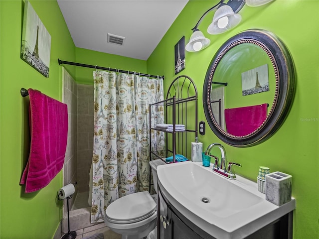 bathroom with toilet, vanity, a shower with curtain, and tile patterned floors