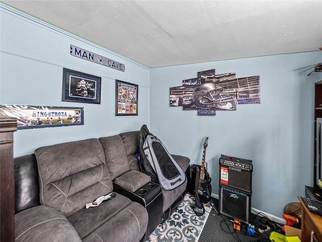 living room featuring a textured ceiling and carpet flooring