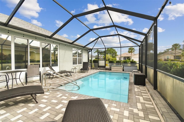 pool featuring a patio and a lanai