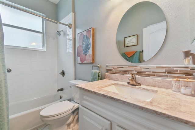 bathroom with decorative backsplash, toilet, vanity, and shower / bathtub combination with curtain