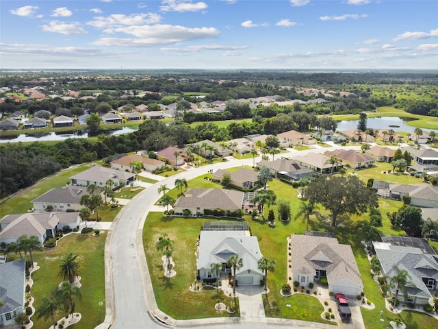 aerial view featuring a water view and a residential view