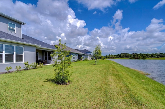 view of yard with a water view