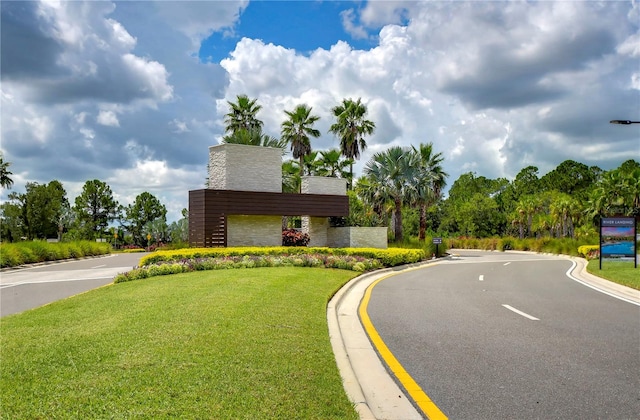 view of street with curbs