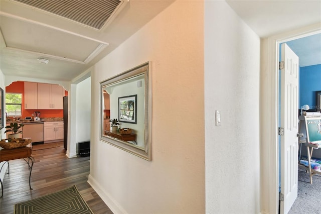 hallway featuring dark wood-type flooring