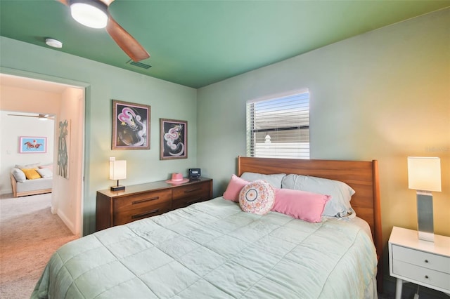 carpeted bedroom featuring ceiling fan