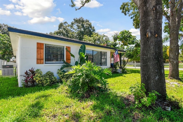 exterior space with a yard