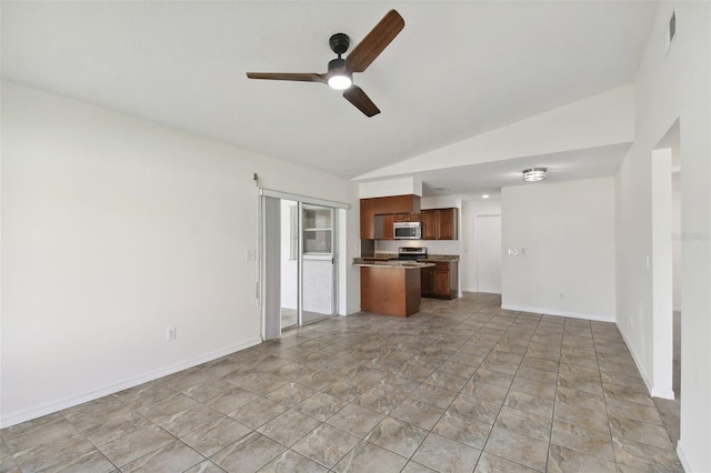 unfurnished living room featuring lofted ceiling and ceiling fan