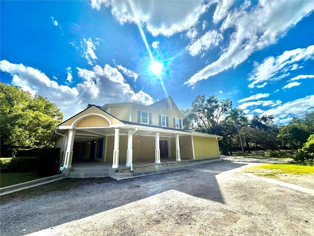 view of front of property featuring covered porch