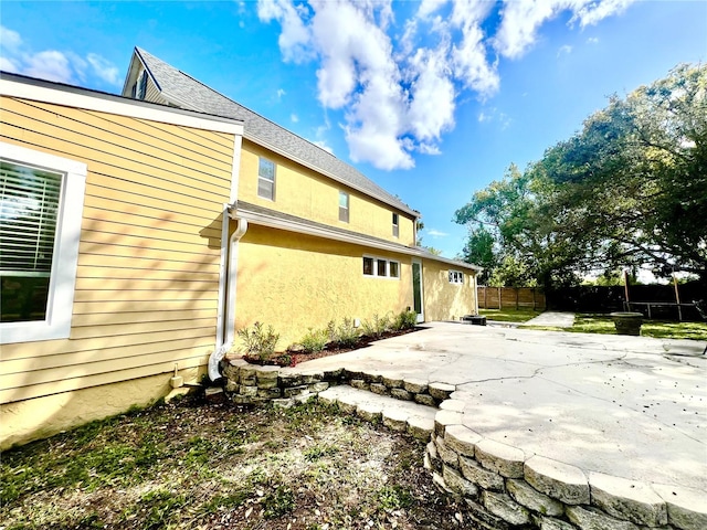 view of home's exterior featuring a patio