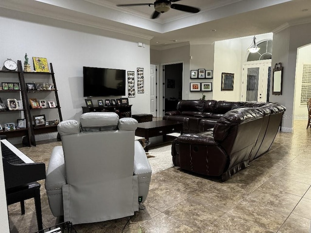 tiled living room featuring crown molding and ceiling fan