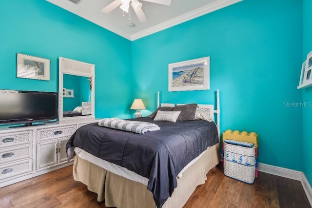 bedroom featuring crown molding, ceiling fan, and dark hardwood / wood-style flooring