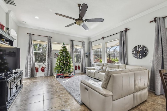 tiled living room featuring crown molding and ceiling fan