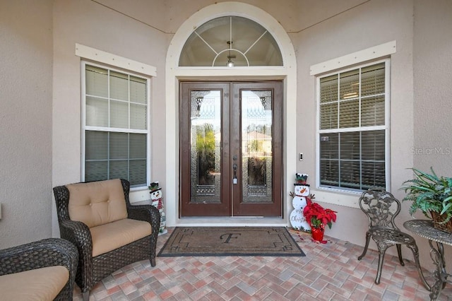 doorway to property with french doors