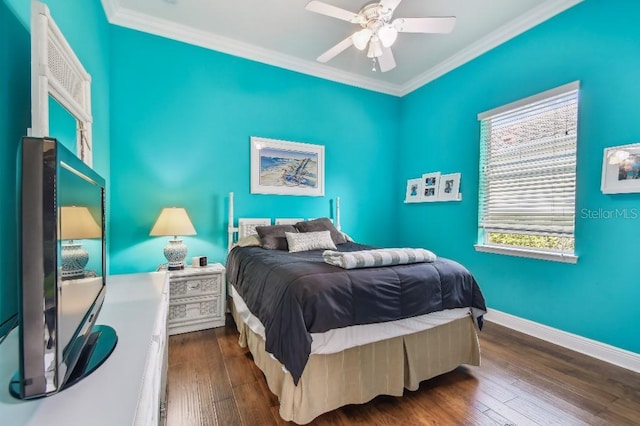 bedroom with crown molding, ceiling fan, and dark hardwood / wood-style flooring