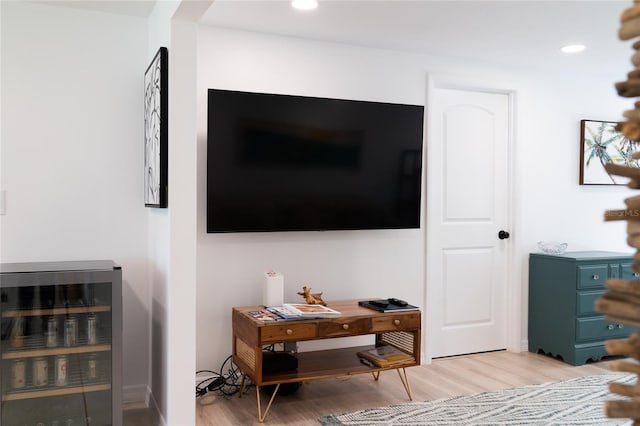 living room featuring light hardwood / wood-style flooring and wine cooler