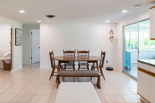 dining room featuring light tile patterned flooring