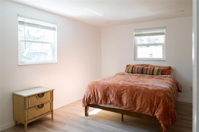 bedroom featuring light wood-type flooring