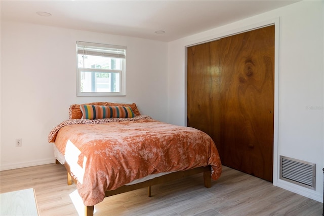 bedroom featuring light hardwood / wood-style flooring