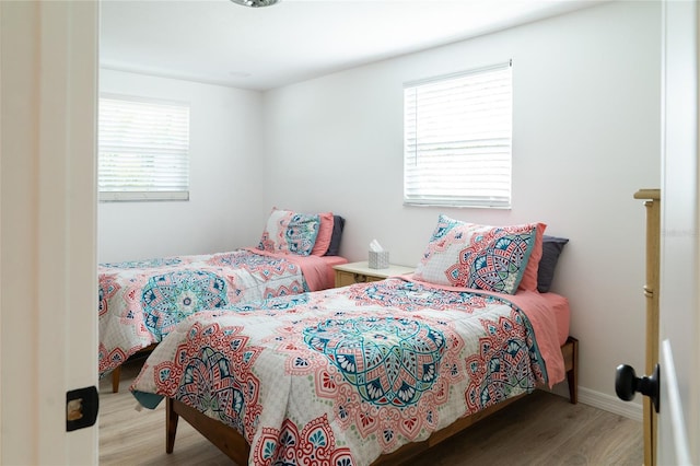 bedroom featuring hardwood / wood-style flooring