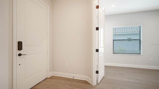 hall featuring light wood-type flooring