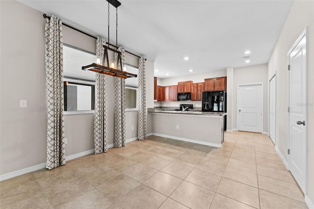 kitchen featuring black appliances, pendant lighting, kitchen peninsula, and light tile patterned flooring