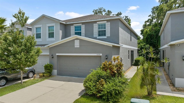 view of front of property with a garage