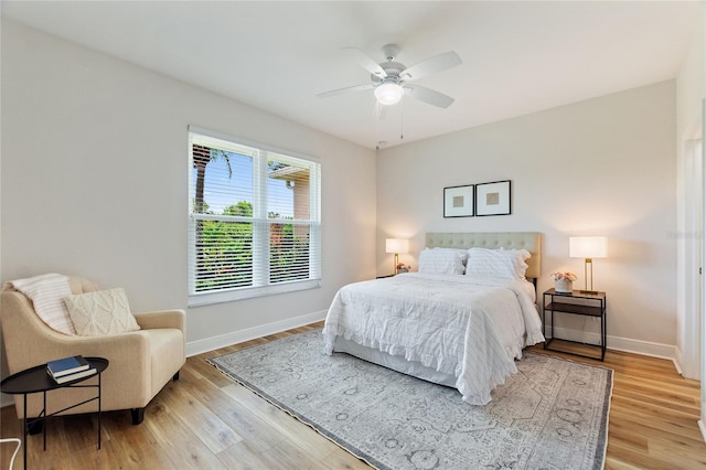 bedroom featuring ceiling fan and light hardwood / wood-style flooring