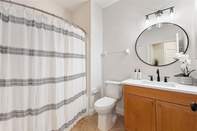 bathroom featuring a shower with shower curtain, tile patterned floors, toilet, and vanity