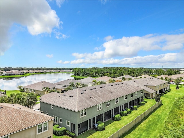 drone / aerial view with a water view