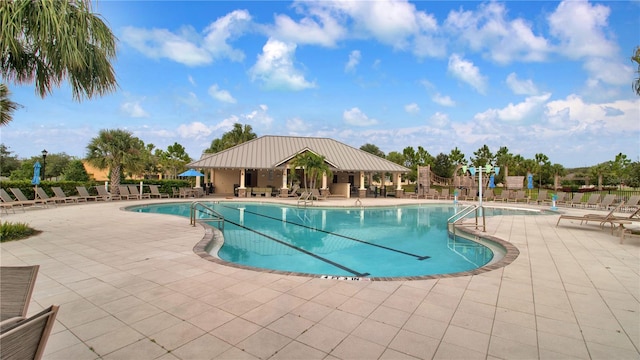 view of pool featuring a patio