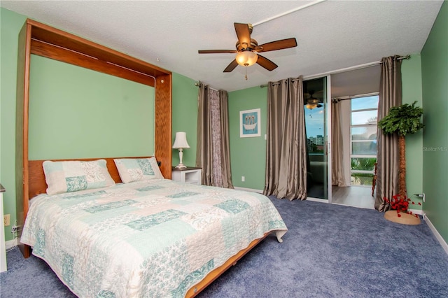 bedroom with a textured ceiling, ceiling fan, and carpet flooring